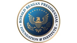 A seal that says ronald reagan presidential foundation and institute.